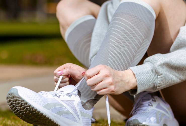 Compression stockings are specially designed socks that apply graduated pressure to the legs. This means they are tighter around the ankles and gradually become looser towards the knees.